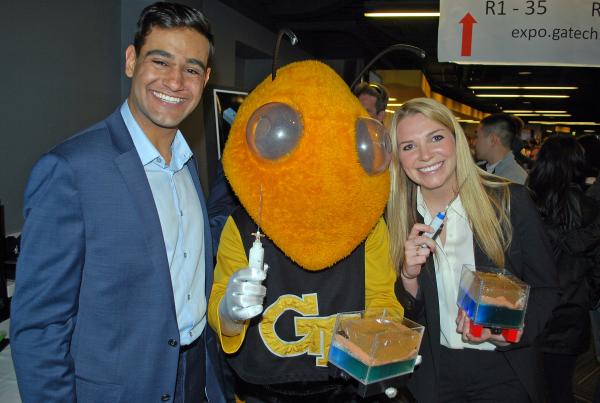 Dev Mandavia and Marci Medford had a special visitor during the Capstone Design Expo.
