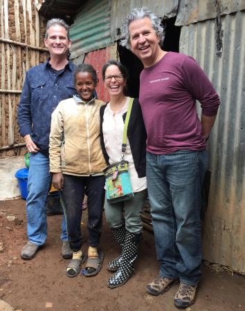 James Stubbs (left), and Katie and Rudy Gleason (at right) visit with one of their hosts (second from left) in Addis Ababa.