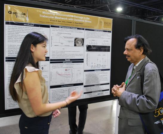 BME student Kristin Gao discusses her research poster with Balakrishna Pai, director of instructional iaboratories for the Coulter Department.