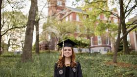 Brielle Lonsberry in cap and gown in front of Tech Tower. (Photo Courtesy: Brielle Lonsberry)