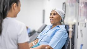 A patient receives chemotherapy treatment from a nurse. (Photo Courtesy: Centers for Disease Control and Prevention)