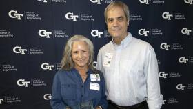 Sandra Maffey accepts her 2022 College of Engineering Staff Innovation & Process Improvement Award from Senior Associate Dean Doug Williams. (Photo: Candler Hobbs)