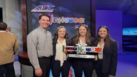 Photo of Neurochamp team members holding ACC InVenture Prize plaque