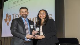 Photo of Sriya Surapaneni holding the Helen Grenga Award Along with BME Senior Academic Professional, Essy Behravesh