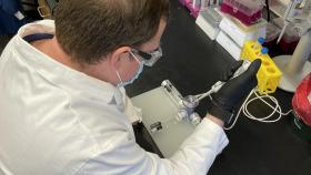 Researcher Daryll Vanover works with the nebulizer he adapted to test a new mRNA-based treatment for flu and Covid-19. The team used mRNA technology to code for a protein called Cas13a that destroys parts of the RNA genetic code that viruses use to replicate in cells in the lungs. It was developed by researchers in Philip Santangelo’s lab in the Wallace H. Coulter Department of Biomedical Engineering. (Photo Courtesy: Daryll Vanover)