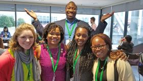 Manu Platt, in the back, reunites with some of his former students at the Biomedical Engineering Society Annual Meeting: from left to right, Meghan Ferrall-Fairbanks, Monet Roberts, Simone Douglas-Green, and Adeola Michael, whom Platt called a “short but powerful crew.” Platt has won the 2021 Mentor Award from the American Association for the Advancement of Science, thanks to a nomination effort led by Roberts and Douglas-Green. (Photo Courtesy: Manu Platt)