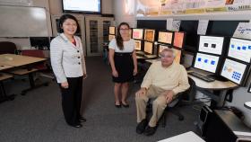 With support from the Centers for Disease Control and Prevention (CDC), Georgia Tech is examining death certificate data to determine what can be learned from these records. Shown are May Dongmei Wang, a professor in the Department of Biomedical Engineering at Georgia Tech and Emory University, and the School of Electrical and Computer Engineering; Paula Braun, entrepreneur-in-residence at the CDC; and Mark Braunstein, M.D., a professor of the practice in Georgia Tech’s College of Computing. (Credit: Rob 