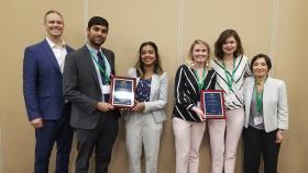 Two teams of BME students were awarded their prizes from the DEBUT Challenge at last week's BMES Meetings in Philadelphia. Pictured are (left to right), James Rains (professor of the practice, and director of the BME Capstone program), and BME students Pranav Dorbala, Madhu Baskaran, Bailey Eaton, Rachel Mann, and NIBIB Program Director Zeynep Erim.