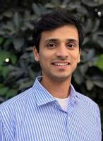headshot photo of Karthik Menon