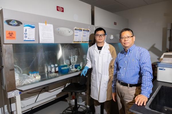 Jichuan Qiu, a postdoctoral fellow at Georgia Tech and Younan Xia, professor and Brock Family Chair in the Wallace H. Coulter Department of Biomedical Engineering at Georgia Tech and Emory University. (Credit: Allison Carter)