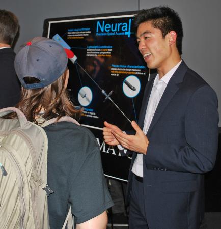 Cassidy Wang explains Neuraline's work to interested guests at the Capstone Design Expo.