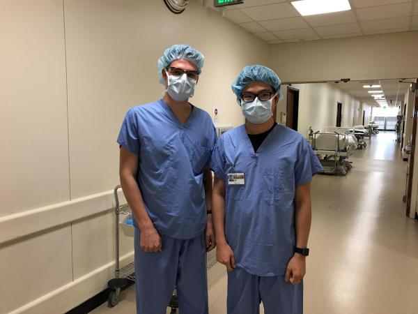 Trainees preparing to observe a minimally invasive gastric bypass surgery at Emory Midtown Hospital. Pictured left to right: Henry Clever (BME) &amp; Jin Xu (ECE)