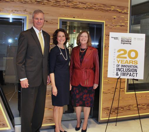 Coulter Department Chair Susan Margulies (center) is flanked by Georgia Tech President Bud Peterson and Emory University President Claire Sterk.