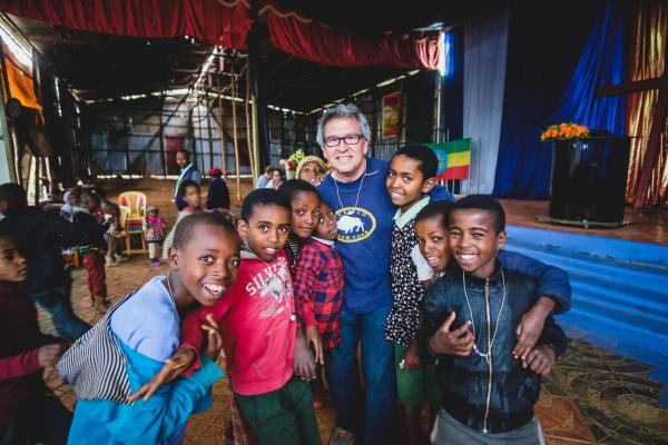 Rudy Gleason with children in Ethiopia 