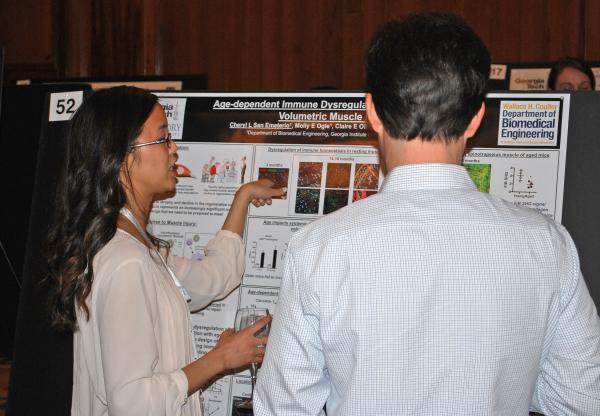 Georgia Tech grad student Cheryl San Emeterio explains her research during the poster session.