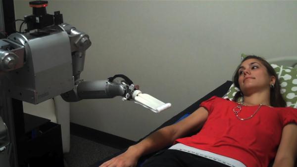 In the study, researchers looked at how people responded when a robotic 
nurse, known as Cody, touched and wiped a person’s forearm. Although 
Cody touched the  subjects in exactly the same way, they reacted more 
positively when they believed Cody intended to clean their arm versus 
when they believed Cody intended to comfort them.Photo: Georgia Tech