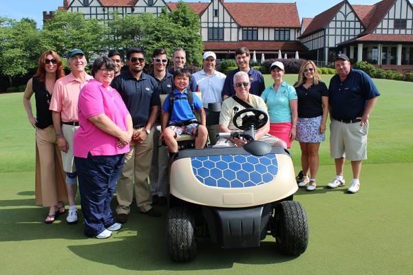 Georgia Tech students, faculty, CSF Foundation board members, E-Z-GO, Bobby Baird, and his mom gathered at East Lake Golf Club.