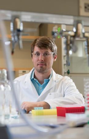 James Dahlman, an assistant professor in the Wallace H. Coulter Department of Biomedical Engineering at Georgia Tech and Emory University, is shown in his laboratory. (Credit: Christopher Moore, Georgia Tech)