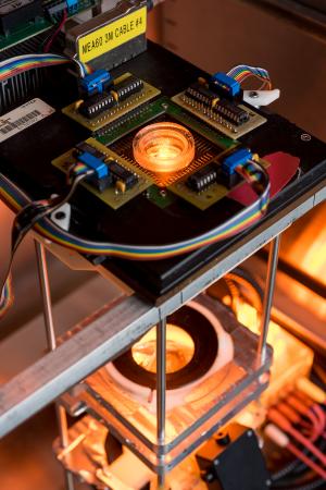 This image shows the full stimulation light train of the optoclamp, which uses a computer to acquire and process the neuronal response to optical stimuli in real-time and then vary the light input to maintain a desired firing rate. (Credit: Rob Felt, Georgia Tech)