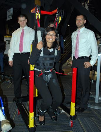Sushmita Hoque of Joey on the Move demonstrates the assistive mobility device her team developed.