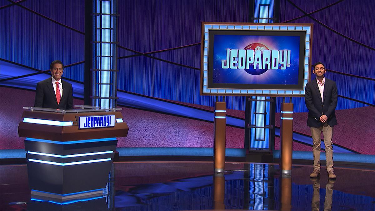 Biomedical engineering student Keshav Shah in the Jeopardy! studio with fill-in host Sanjay Gupta. After years of taking the contestant quiz, Shah competed on show Jeopardy! on the July 7, 2021, episode. (Photo Courtesy: Keshav Shah)