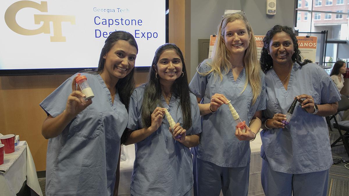 Team NICUties with their device that ensures premature babies get all the vital fat content in the breast milk they receive in the neonatal intensive care unit. The newborns are typically fed via tube, but the process of collecting and handling breast milk usually results in the loss of key lipid content crucial for the growing babies. (Photo: Joshua Stewart)