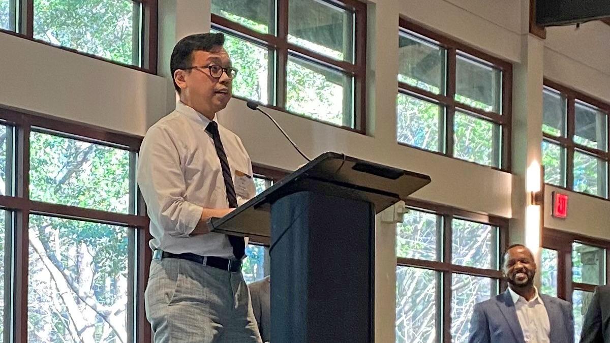 Wilbur Lam accepts the Corporate Partnership of the Year award on behalf of the ACME POCT team during the Emory University Office of Technology Transfer annual celebration April 14. (Photo: Jess Beach)