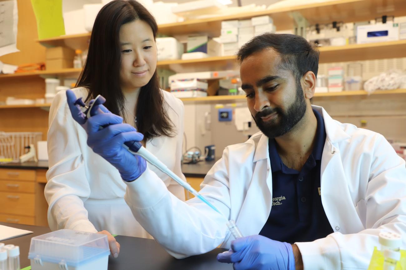 Photo of Leslie Chan and graduate student Vishal Manickam
